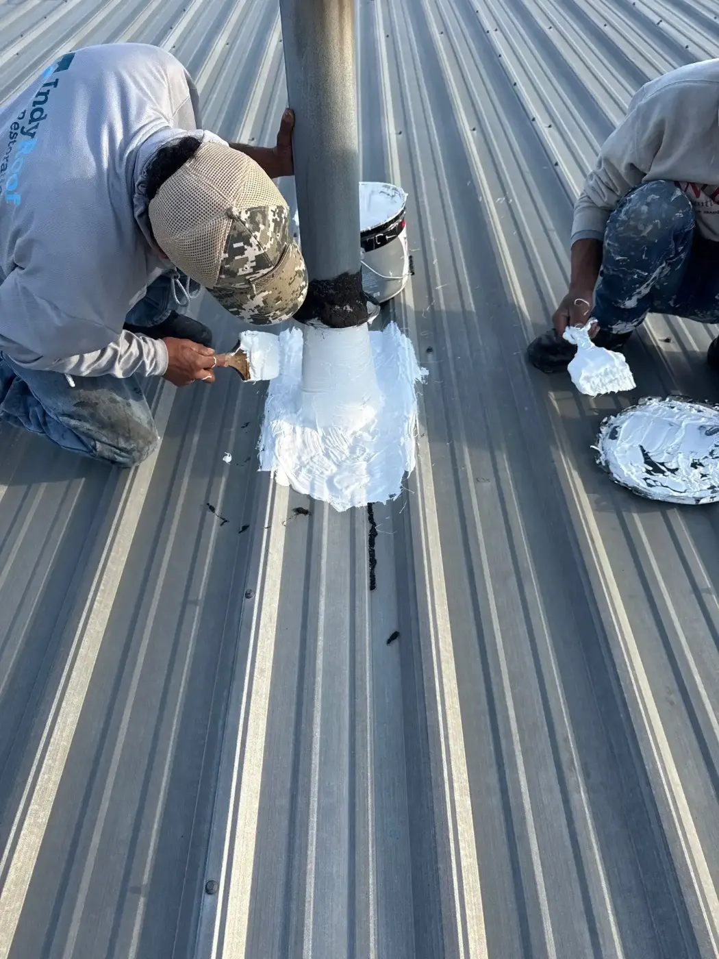 Tarping and dry-in on a Springmill Villages commercial roof